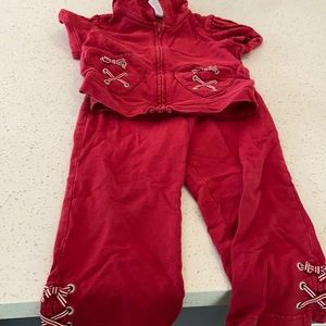 Short sleeve zip up jacket with pants.